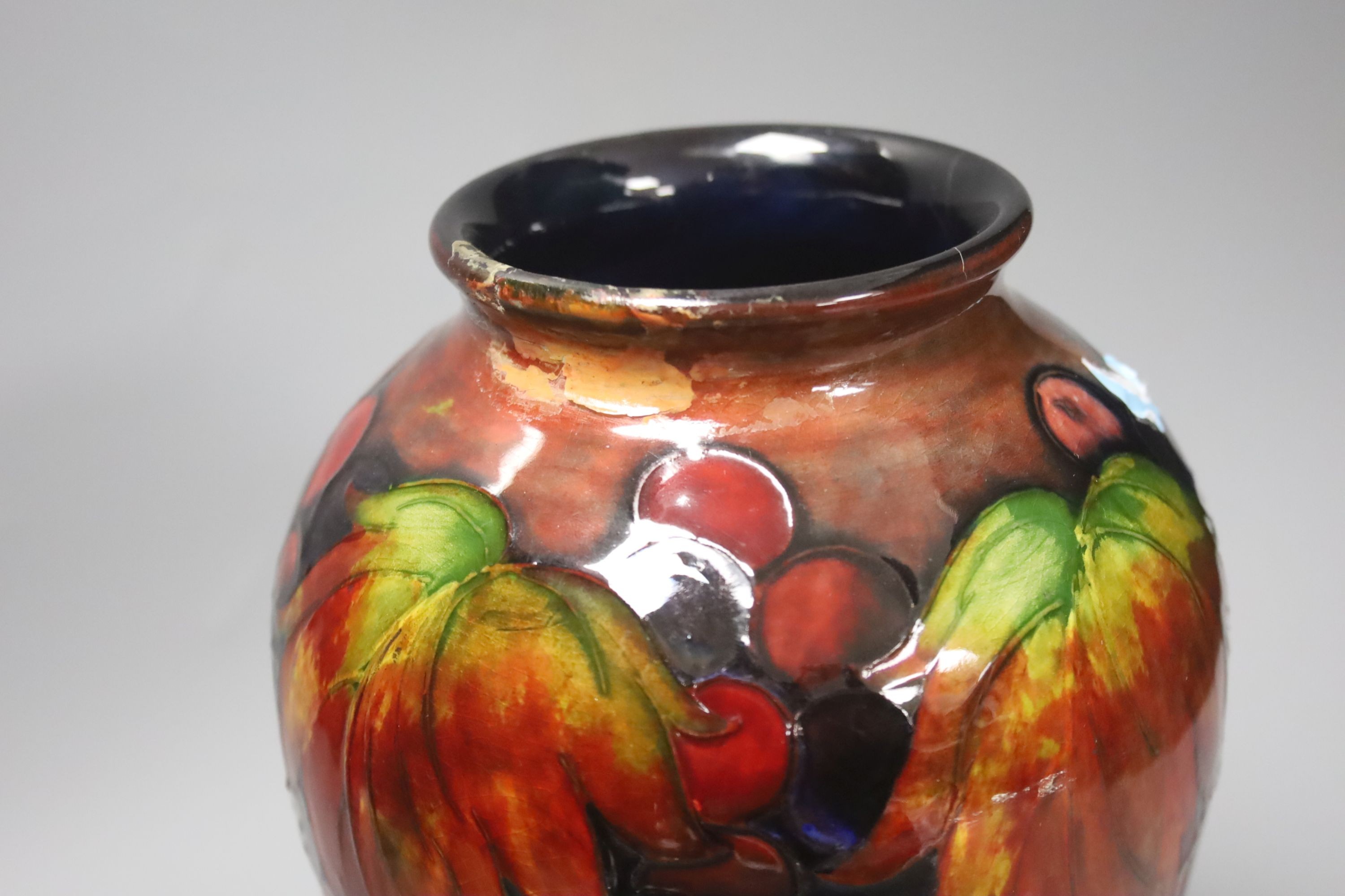 A Moorcroft flambe leaf and berry baluster vase (a.f.) 23.5cm